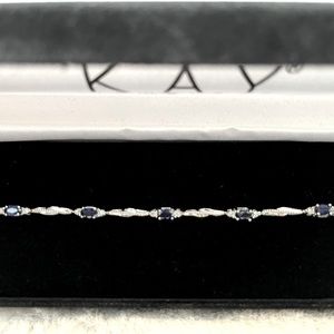 Kay Jewlers bracelet. 10k white gold Blue sapphire with diamond accents.